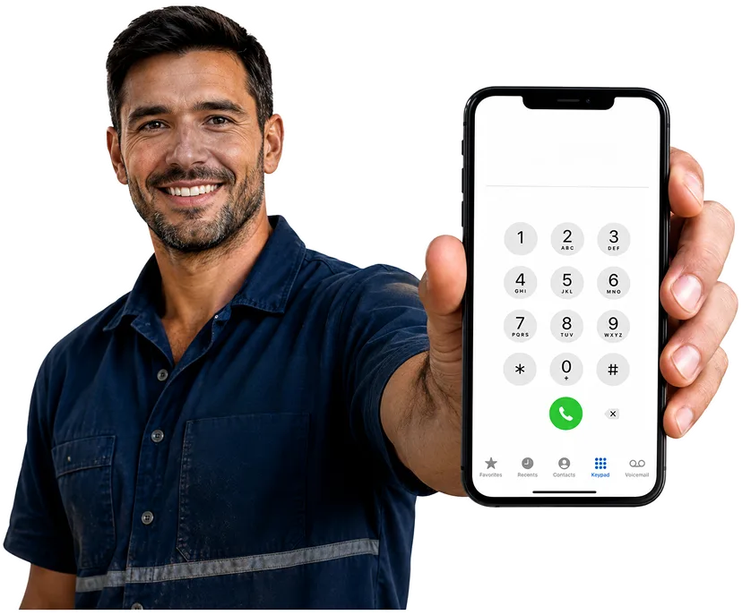 Plumber on the phone taking a Moore Park callout